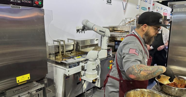 At NAFEM, robots slip mostly into the background